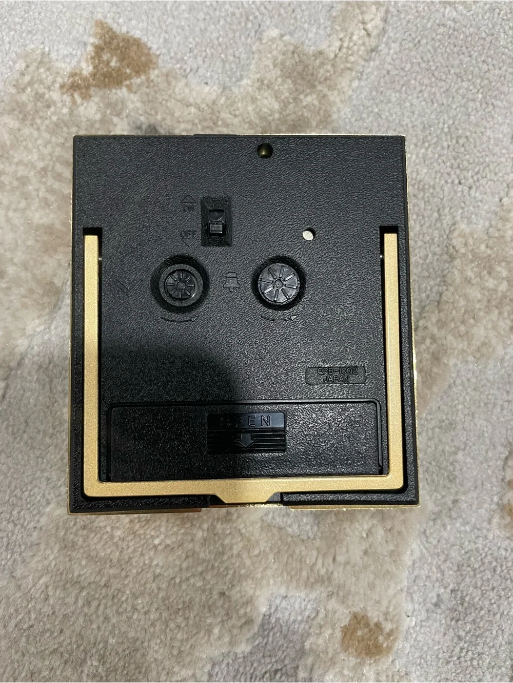Citizen Gold Frame Clock with Black Dial and Luminous Markers